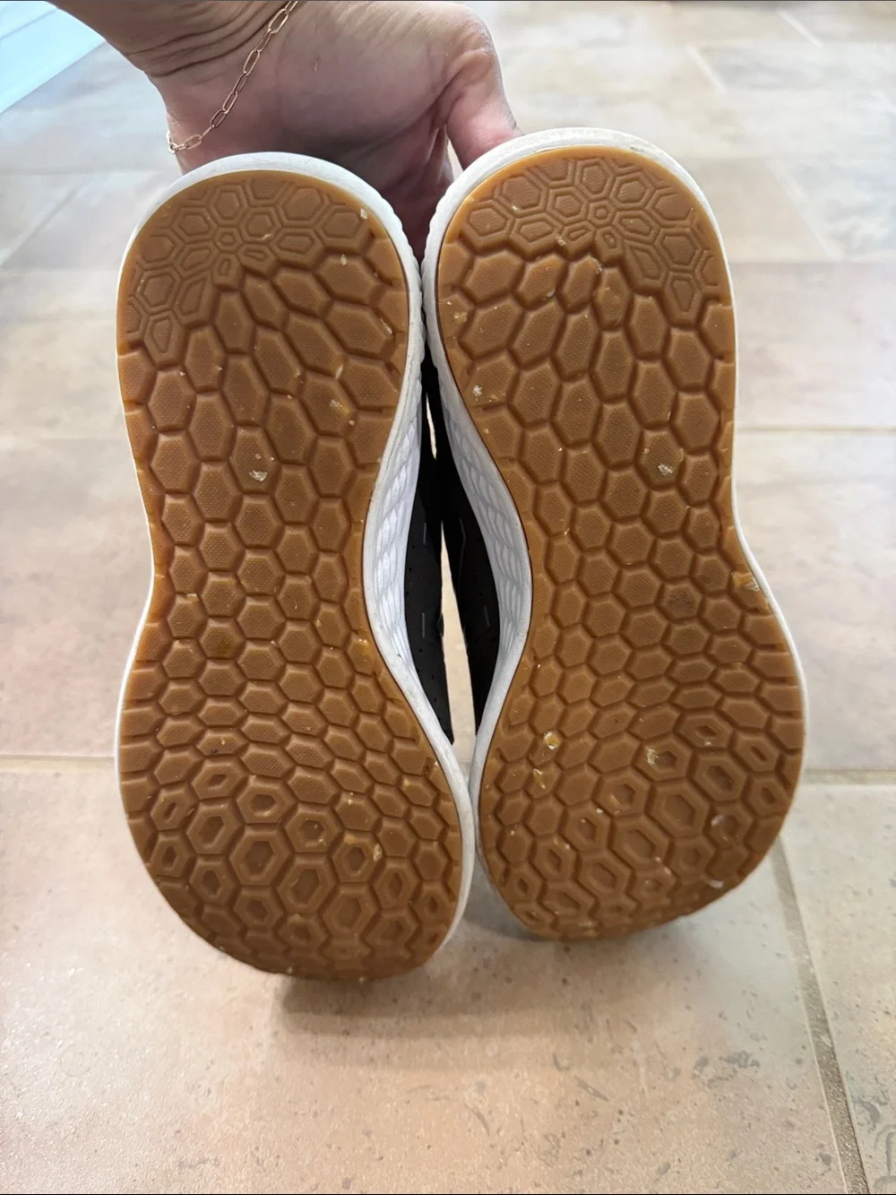Reposhing—- New Balance Black Knit Sneakers with Brown Accents